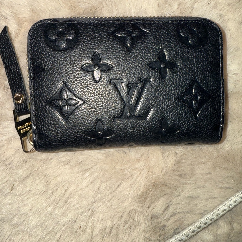 Louis Vuitton Embossed Black Leather Wallet